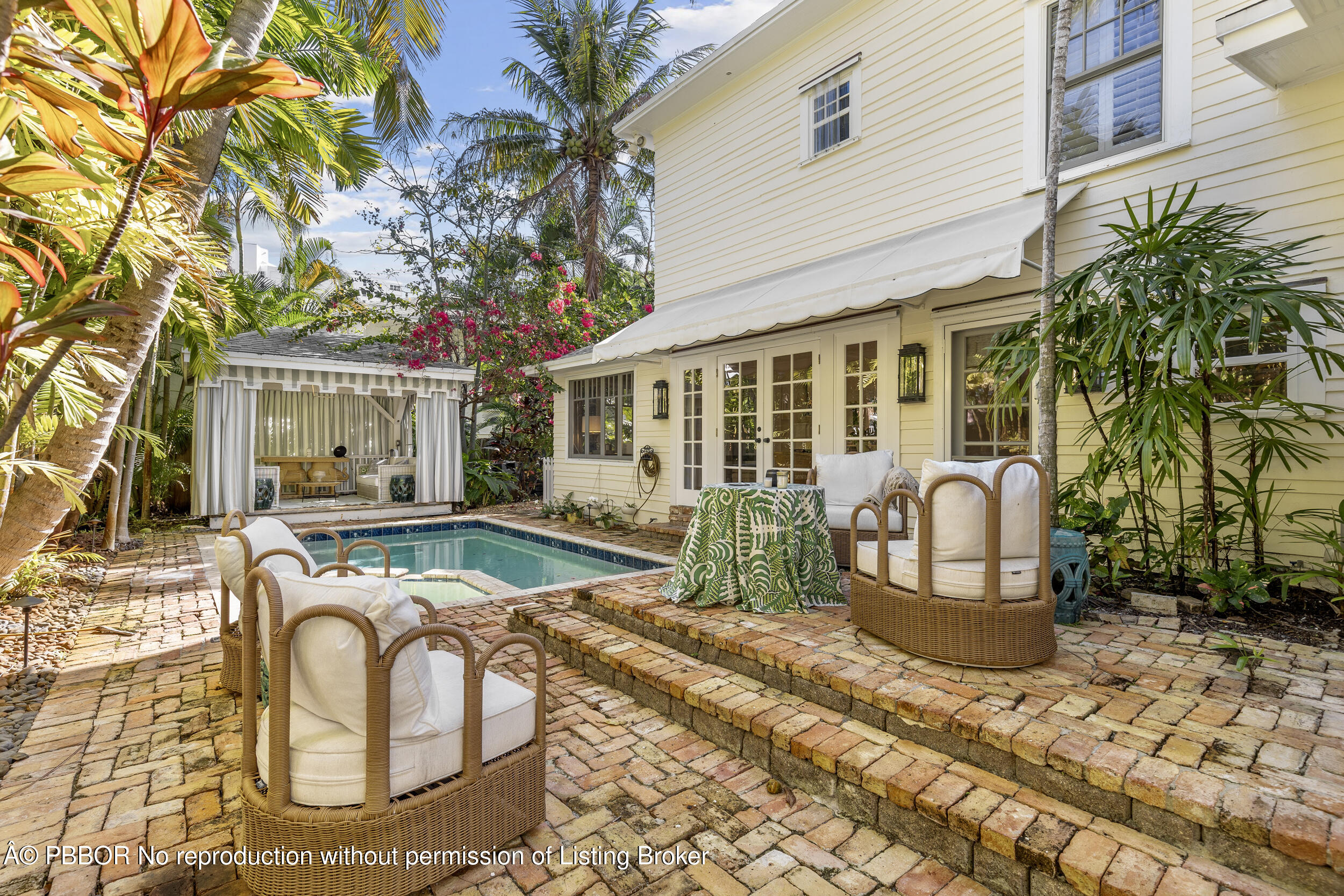 321 Croton Way West Palm Beach, FL 33401 - Photo 36 of 40 a view of a house with backyard sitting area and garden