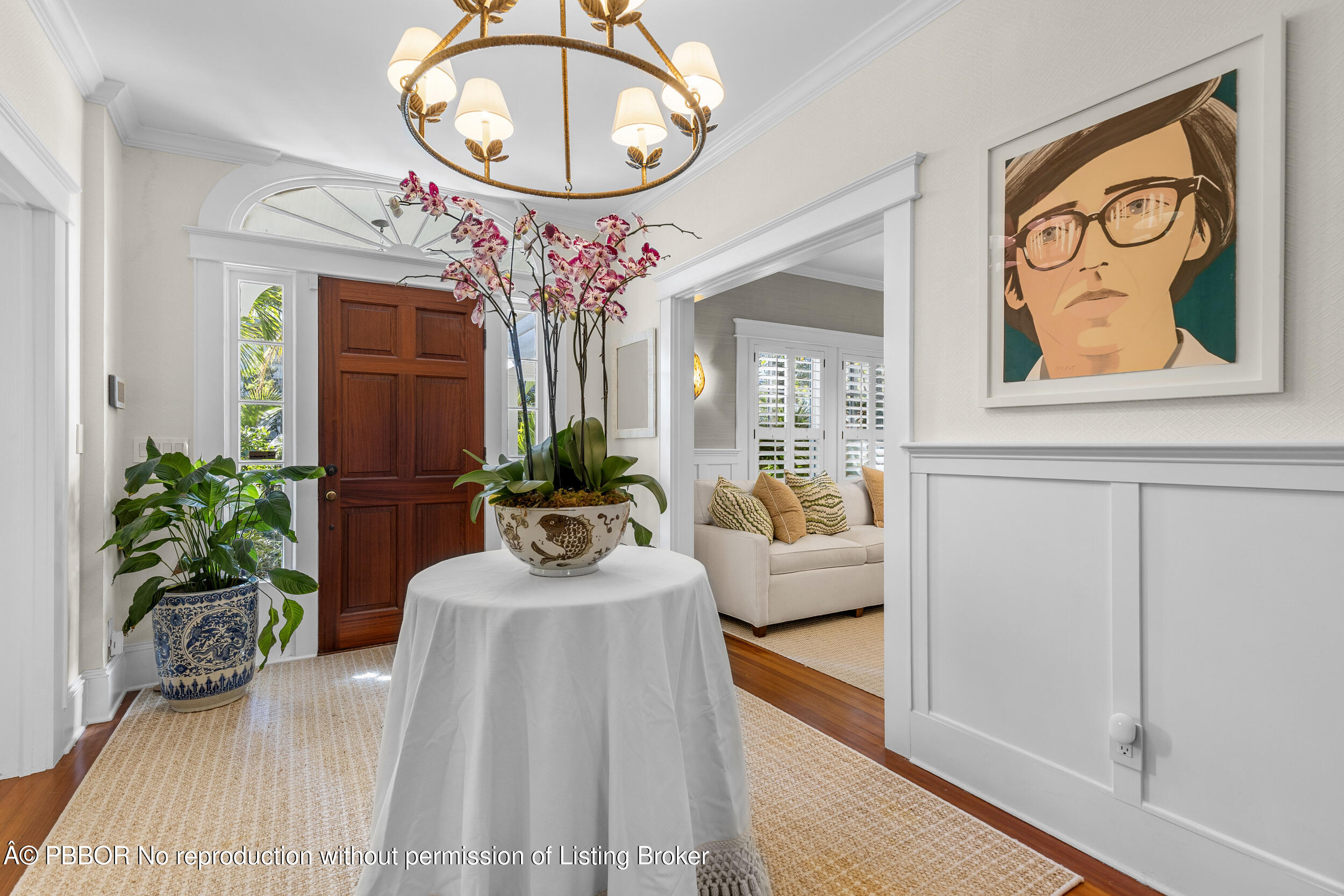 321 Croton Way West Palm Beach, FL 33401 - Photo 4 of 40 a lobby with furniture and wooden floor