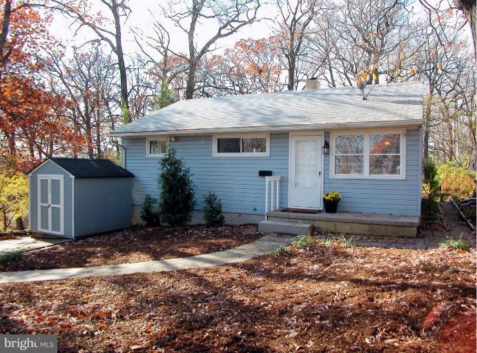 7920 Ridgely Oak Road Parkville, MD 21234 - Photo 13 of 13 a view of a house with a yard