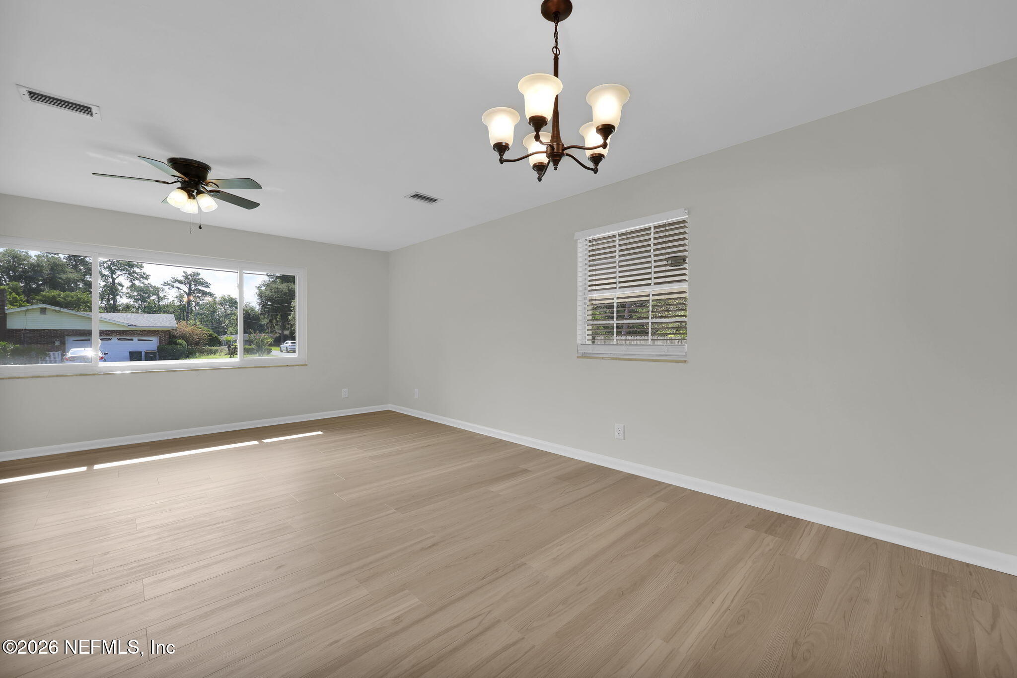 8544 Sanchez Road Jacksonville, FL 32217 - Photo 15 of 46 a view of an empty room with a window