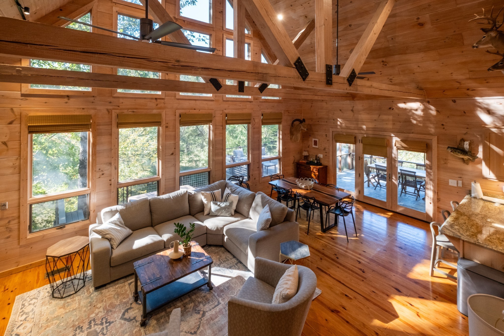 170 Warriors Path Road Summertown, TN 38483 - Photo 29 of 69 a living room with furniture a wooden floor and a large window
