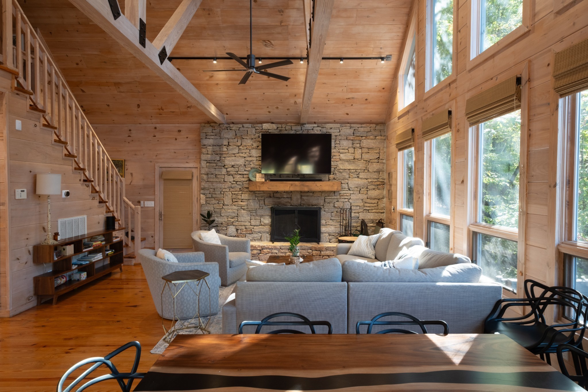 170 Warriors Path Road Summertown, TN 38483 - Photo 31 of 69 a living room with furniture a fireplace and a flat screen tv