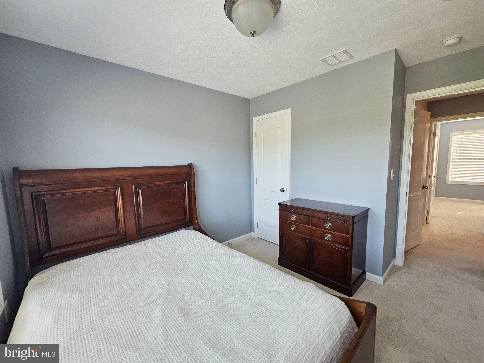 466 Stableview Court Duncansville, PA 16635 - Photo 17 of 22 Serene bedroom with soft gray tones.