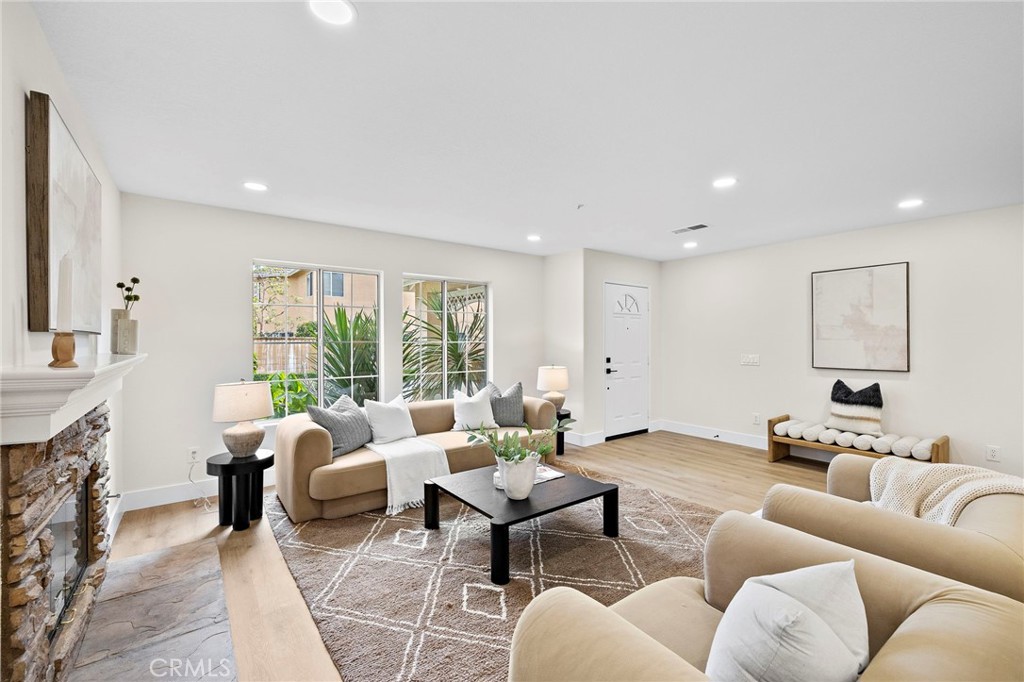 17 Rhode Island Irvine, CA 92606 - Photo 12 of 62 a living room with furniture and a large window