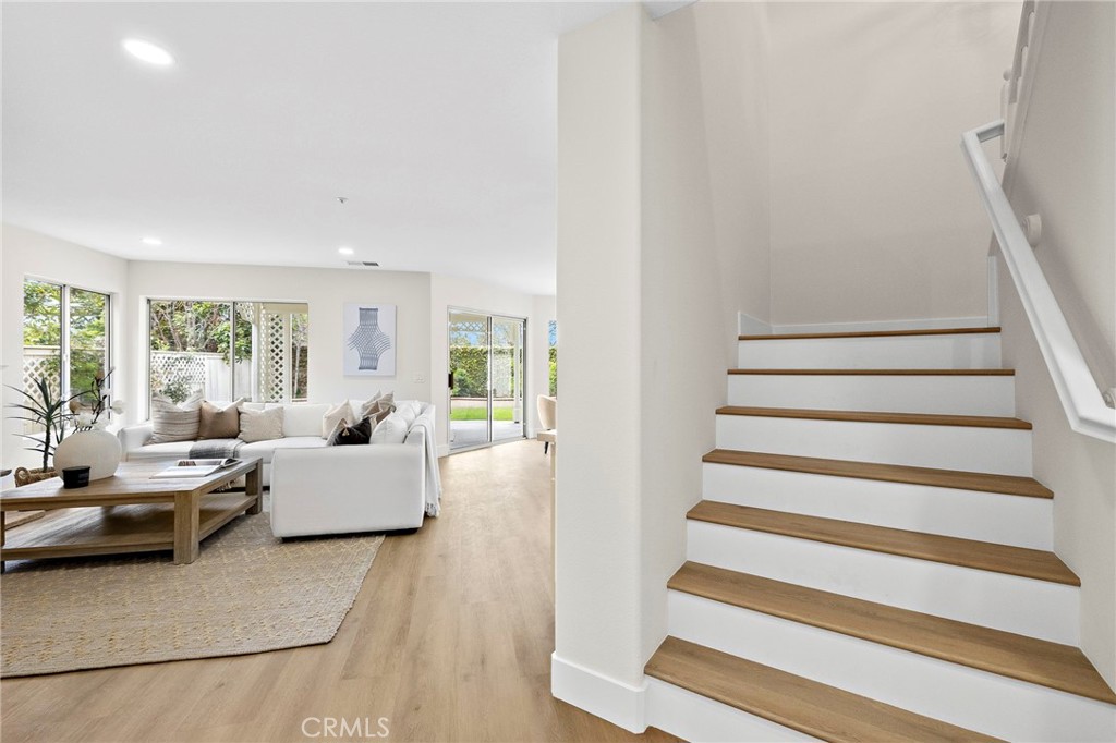 17 Rhode Island Irvine, CA 92606 - Photo 15 of 62 a living room with furniture and a large window