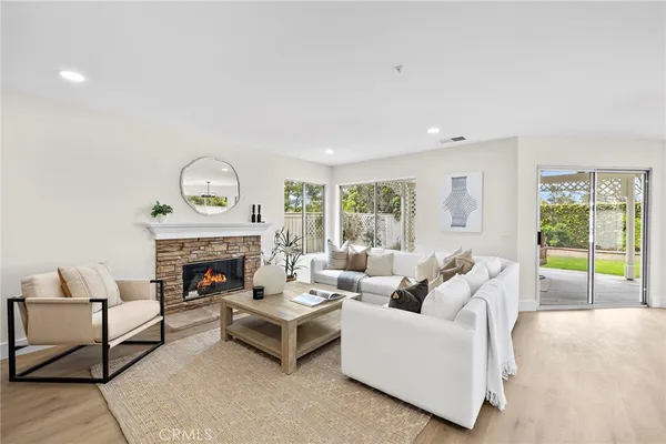 a bathroom with a sink a mirror and a toilet