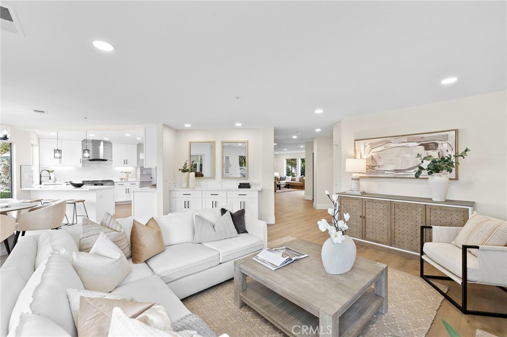 17 Rhode Island Irvine, CA 92606 - Photo 18 of 62 a living room with furniture kitchen view and a table