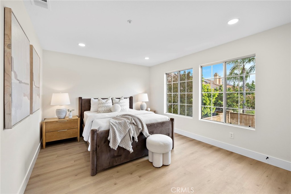17 Rhode Island Irvine, CA 92606 - Photo 41 of 62 a bedroom with bed and window