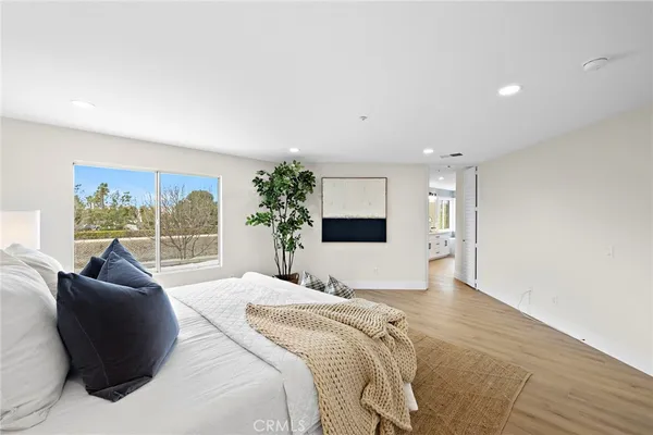 a view of a house with backyard porch and garden
