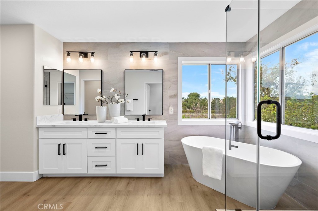 17 Rhode Island Irvine, CA 92606 - Photo 49 of 62 a large white kitchen with a large window