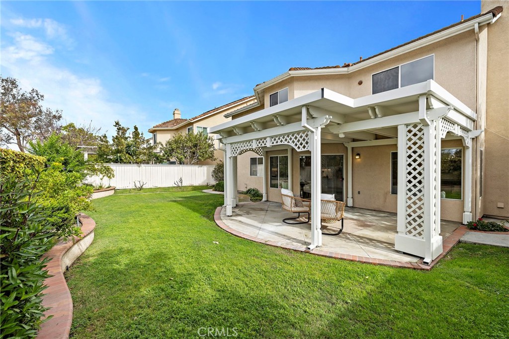 17 Rhode Island Irvine, CA 92606 - Photo 53 of 62 a view of a house with backyard porch and garden