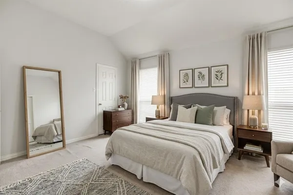 an empty room with a chandelier fan