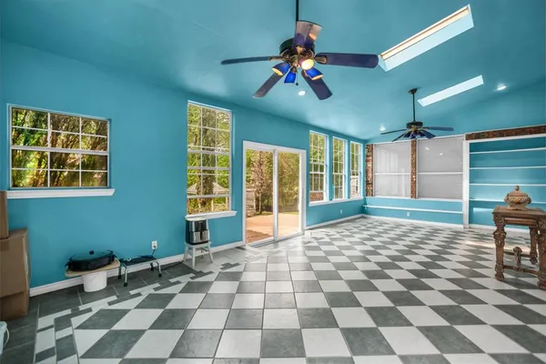 a picture of a bathroom with a shower