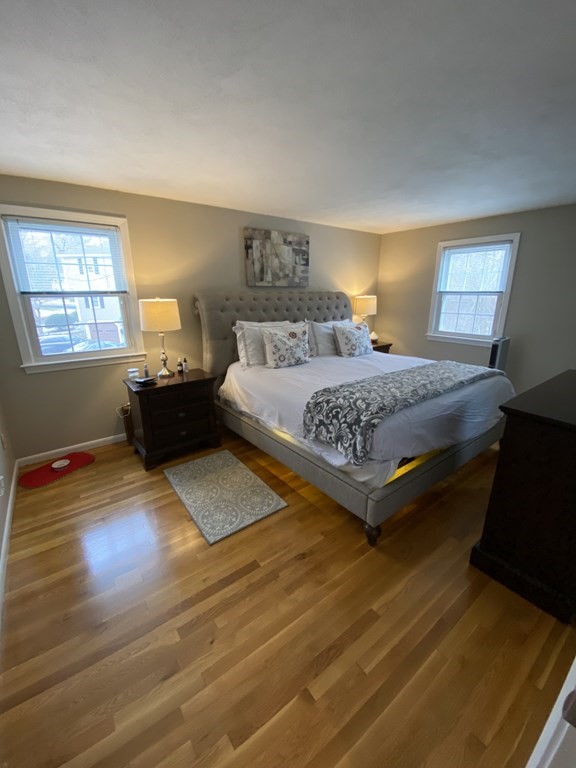 16 Bacon Road Framingham, MA 01701 - Photo 13 of 30 a bedroom with a bed and window