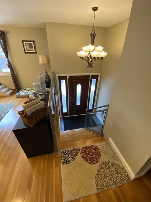 16 Bacon Road Framingham, MA 01701 - Photo 20 of 30 a view of a livingroom with furniture and a chandelier