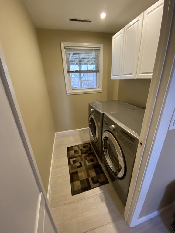 16 Bacon Road Framingham, MA 01701 - Photo 25 of 30 a utility room with dryer and washer