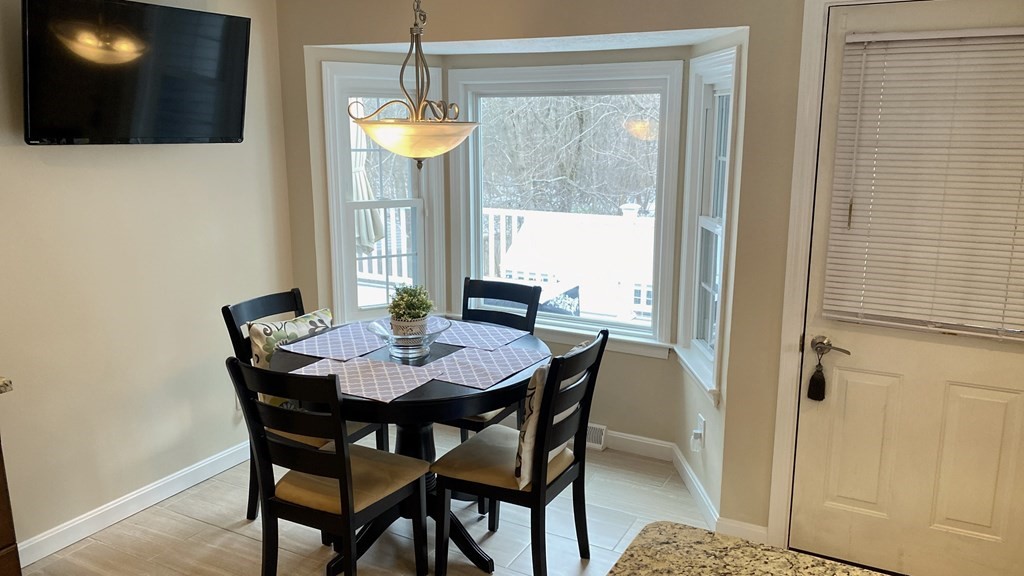 16 Bacon Road Framingham, MA 01701 - Photo 5 of 30 a view of a dining room with furniture and window
