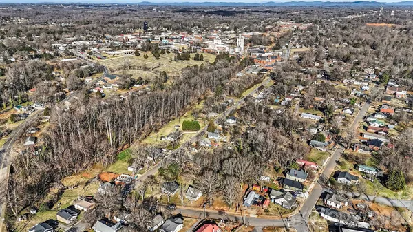 an aerial view of residential house with parking space