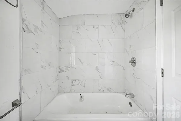 a bathroom with a bathtub