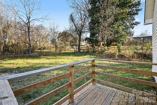 a view of ocean with large trees