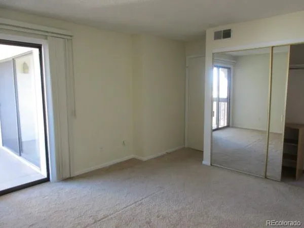 an empty room with closet