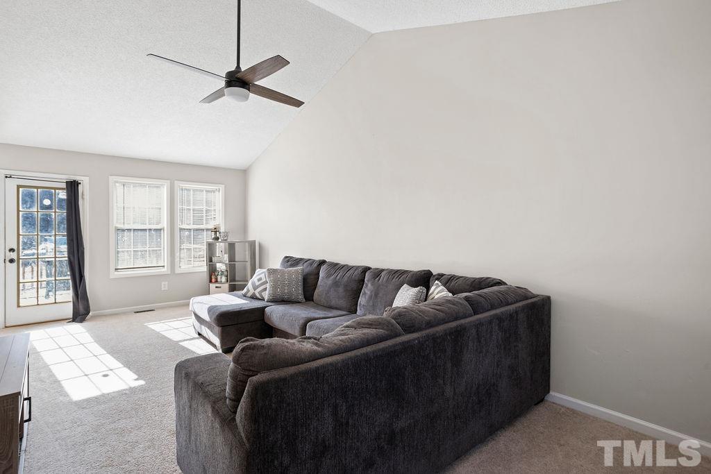 7929 Flower Hill Road Middlesex, NC 27557 - Photo 11 of 28 a living room with furniture and a window