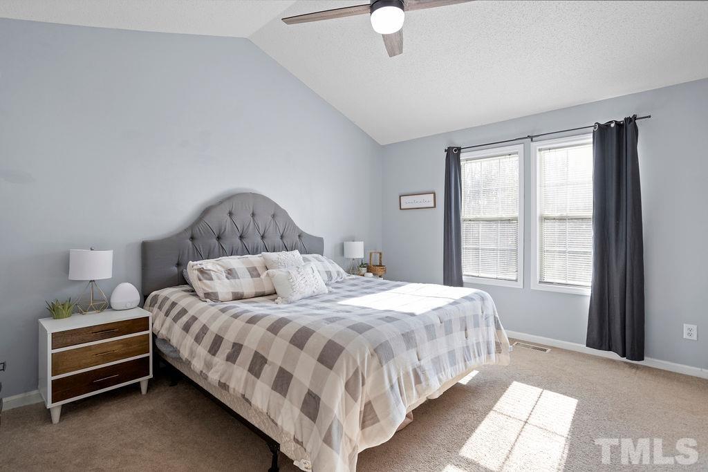 7929 Flower Hill Road Middlesex, NC 27557 - Photo 12 of 28 a bedroom with a bed and a window