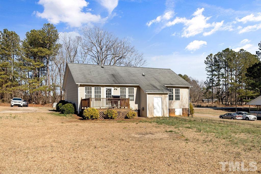 7929 Flower Hill Road Middlesex, NC 27557 - Photo 26 of 28 a front view of a house with a yard