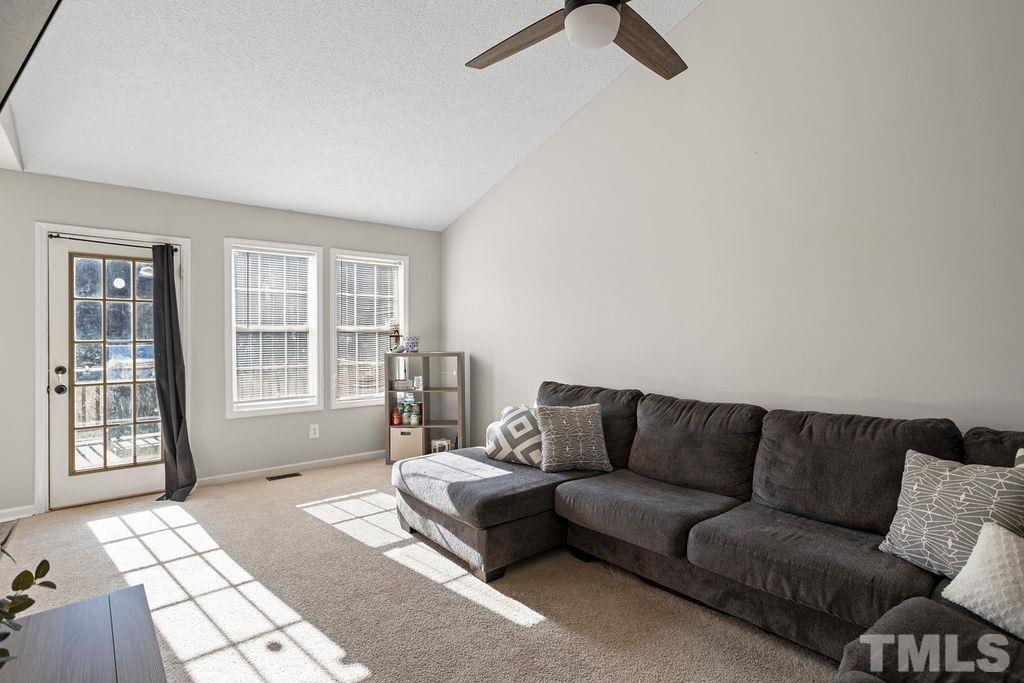 7929 Flower Hill Road Middlesex, NC 27557 - Photo 10 of 28 a living room with furniture and a window