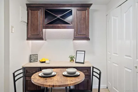 a kitchen with stainless steel appliances a stove sink and cabinets