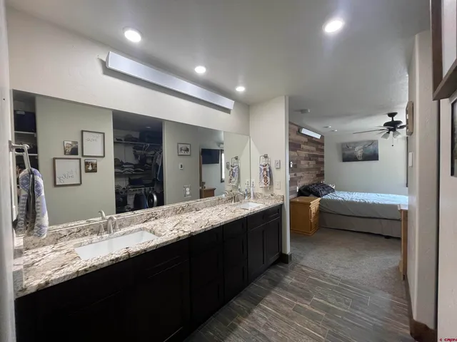 a bathroom with sink shower and bathtub