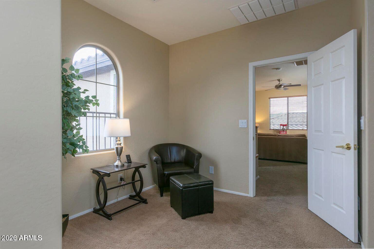 2023 West Shackleton Drive Phoenix, AZ 85086 - Photo 9 of 11 a living room with furniture and a window
