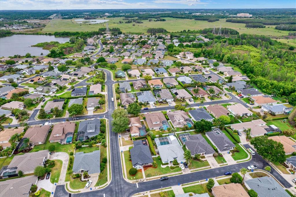 2021 Meadow Rue Court Trinity, FL 34655 - Photo 33 of 41 an aerial view of residential houses with outdoor space and swimming pool