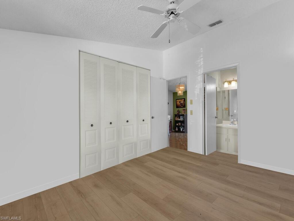 5469 27th Place Southwest Naples, FL 34116 - Photo 8 of 21 a view of a room with an empty room