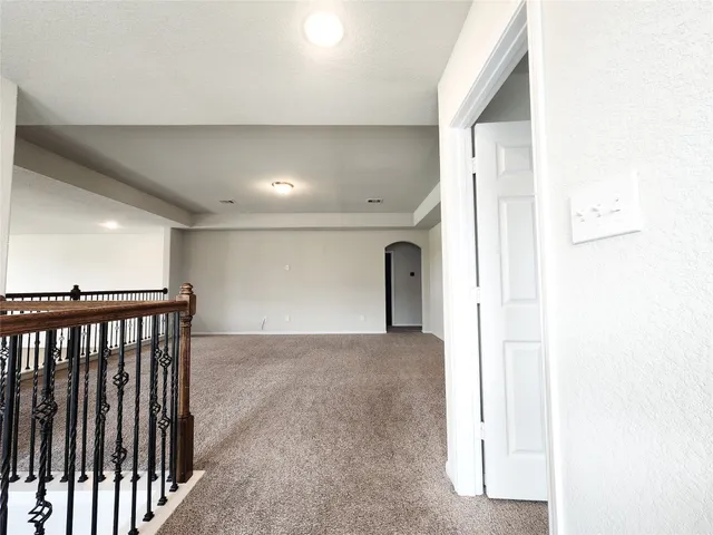 a view of a hallway with entryway