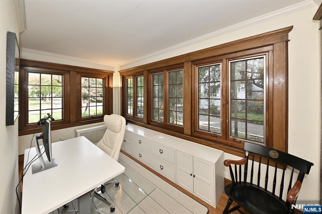 18 Tonawanda Road Glen Rock, NJ 07452 - Photo 13 of 37 a living room with furniture and large windows
