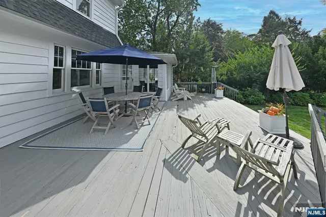 swimming pool view with a seating space