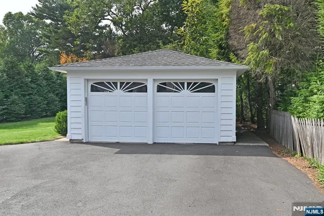 a front view of a house with a garage