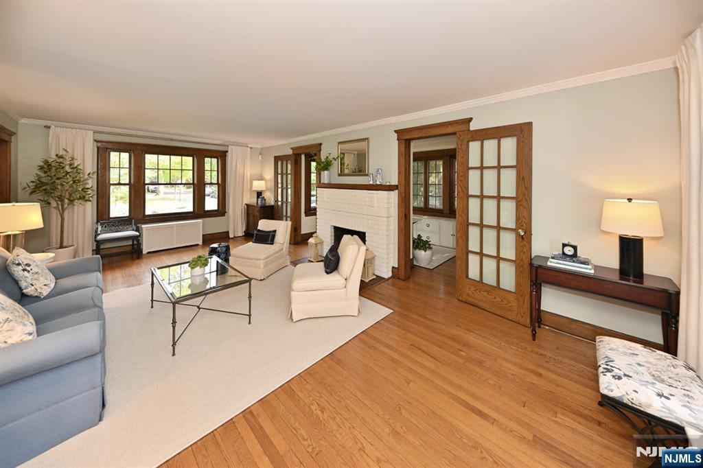18 Tonawanda Road Glen Rock, NJ 07452 - Photo 5 of 37 a living room with furniture and a fireplace