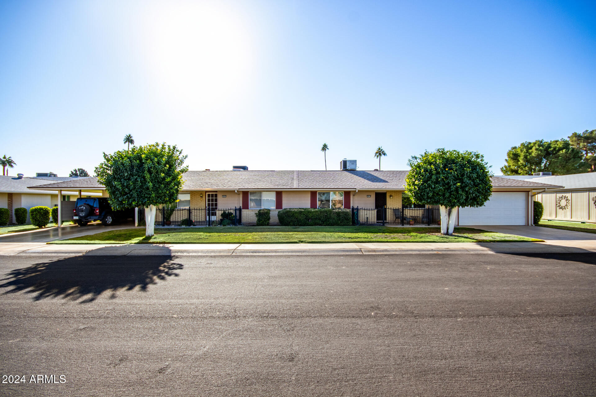 10819 West Hatcher Road Sun City, AZ 85351 - Photo 1 of 51 01 Front