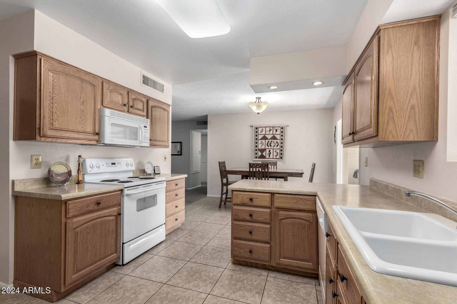10819 West Hatcher Road Sun City, AZ 85351 - Photo 11 of 51 11 Kitchen