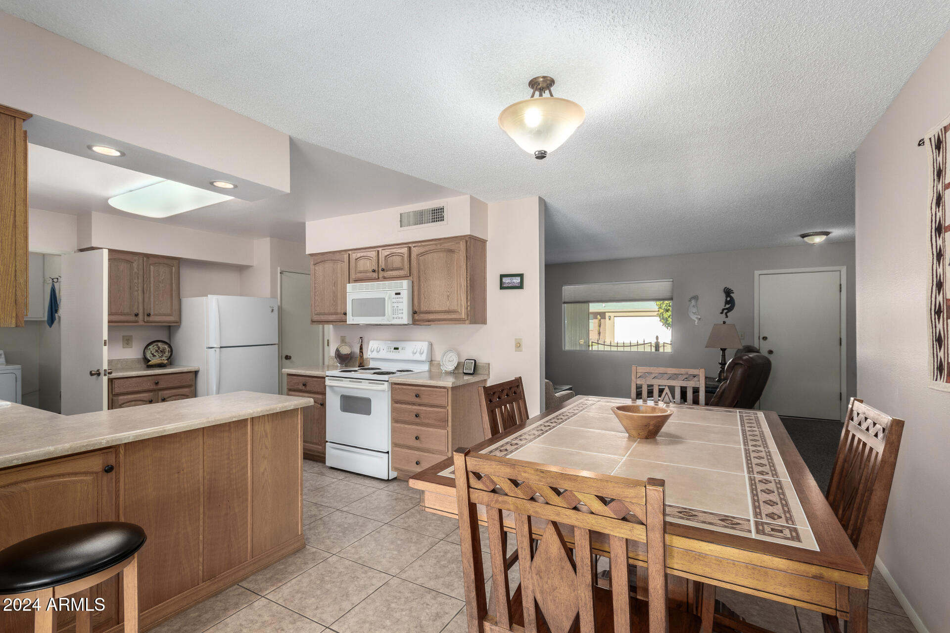 10819 West Hatcher Road Sun City, AZ 85351 - Photo 13 of 51 13 - Kitchen/Dining