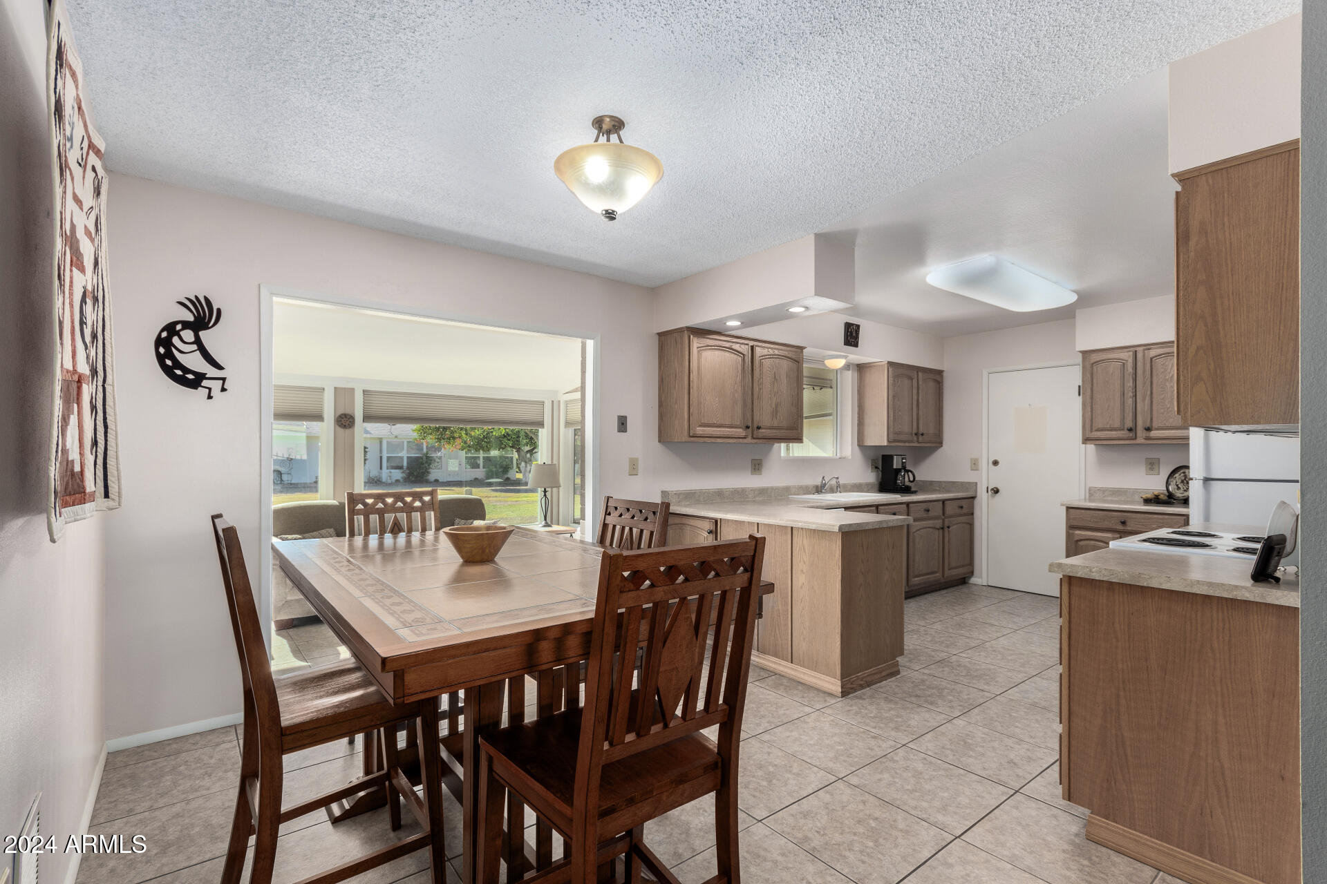 10819 West Hatcher Road Sun City, AZ 85351 - Photo 14 of 51 14 Kitchen/Dining