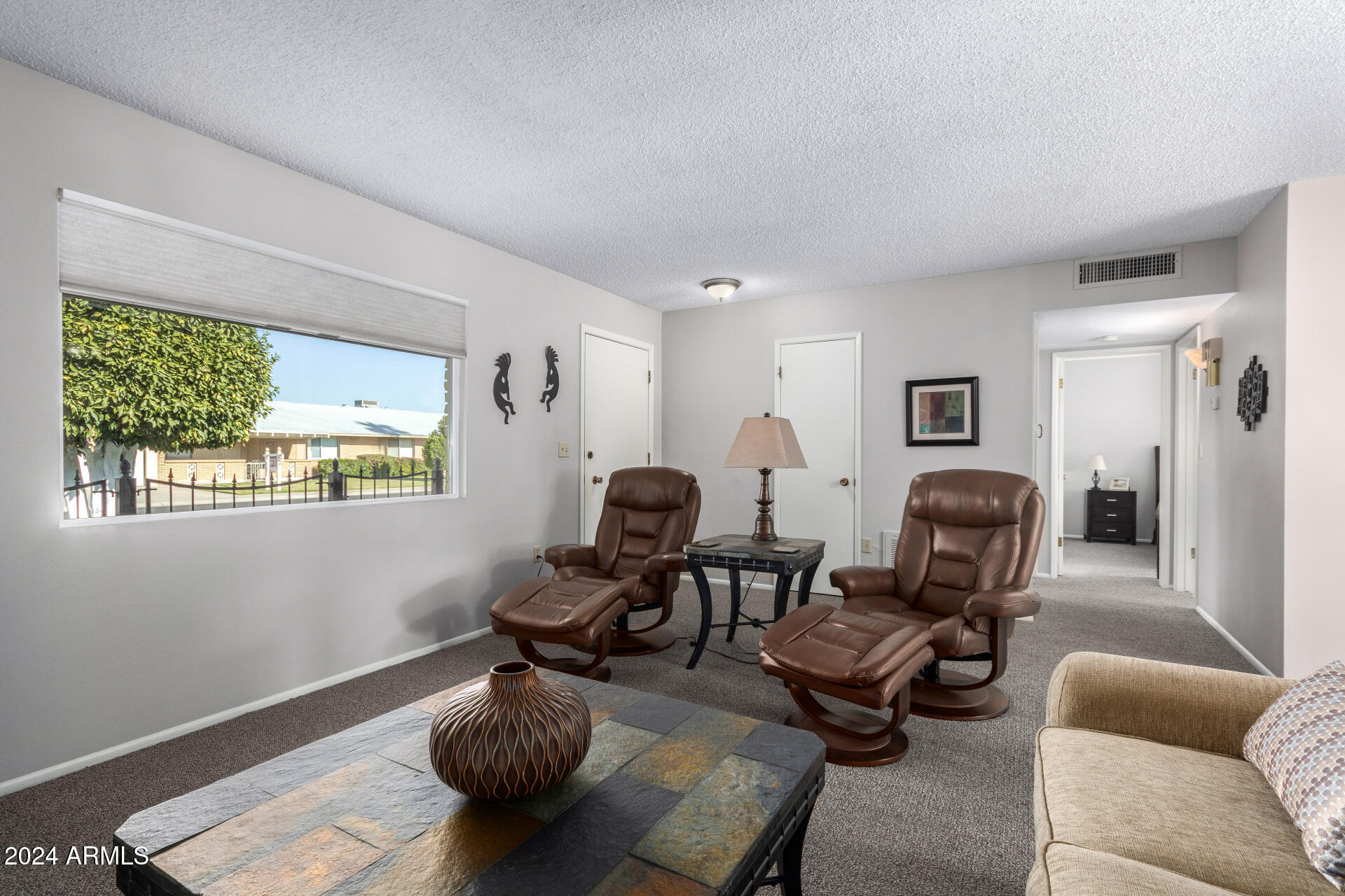 10819 West Hatcher Road Sun City, AZ 85351 - Photo 18 of 51 18 Living Room