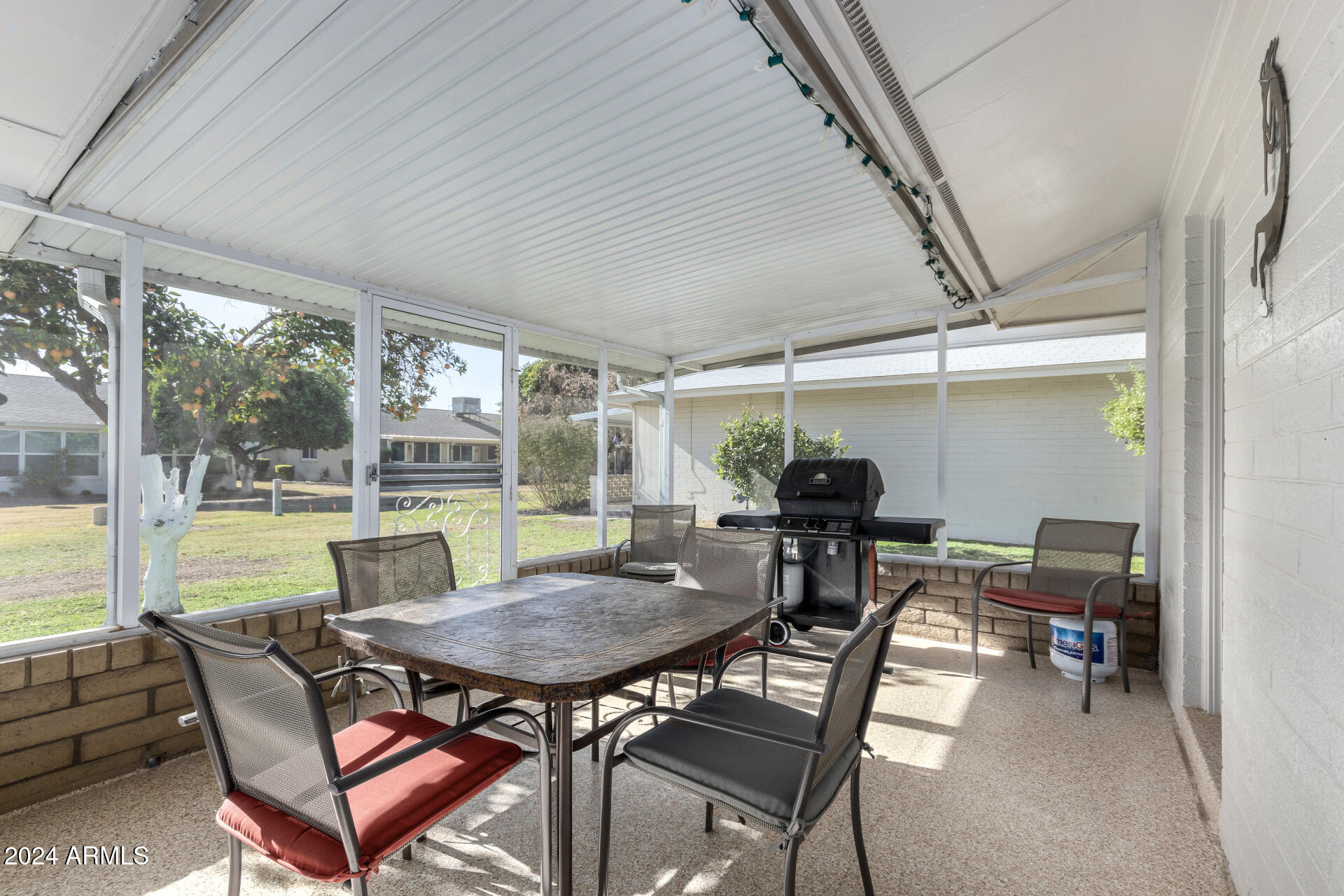 10819 West Hatcher Road Sun City, AZ 85351 - Photo 31 of 51 31 Screened in Patio