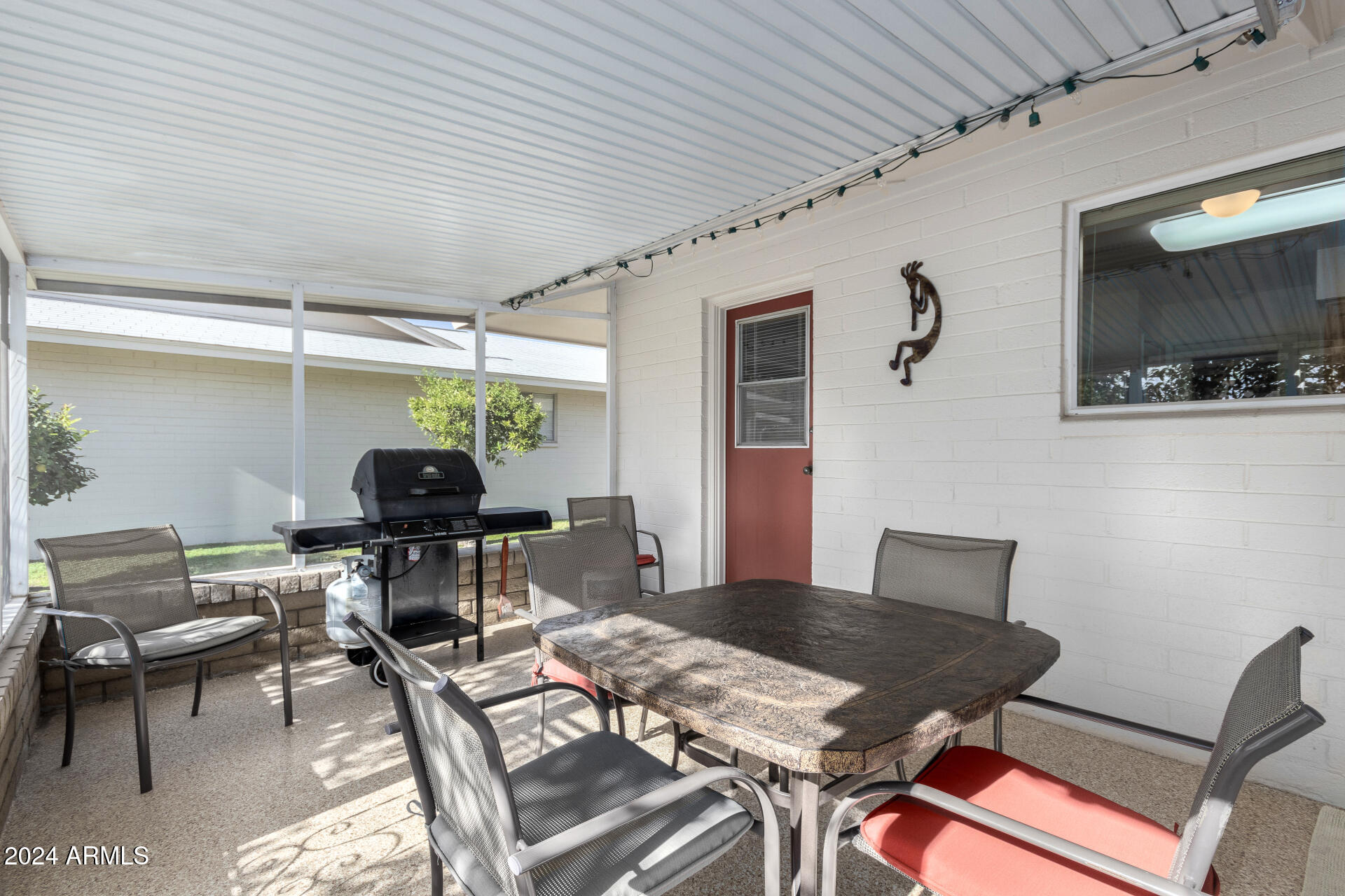 10819 West Hatcher Road Sun City, AZ 85351 - Photo 32 of 51 32 Screened in Patio
