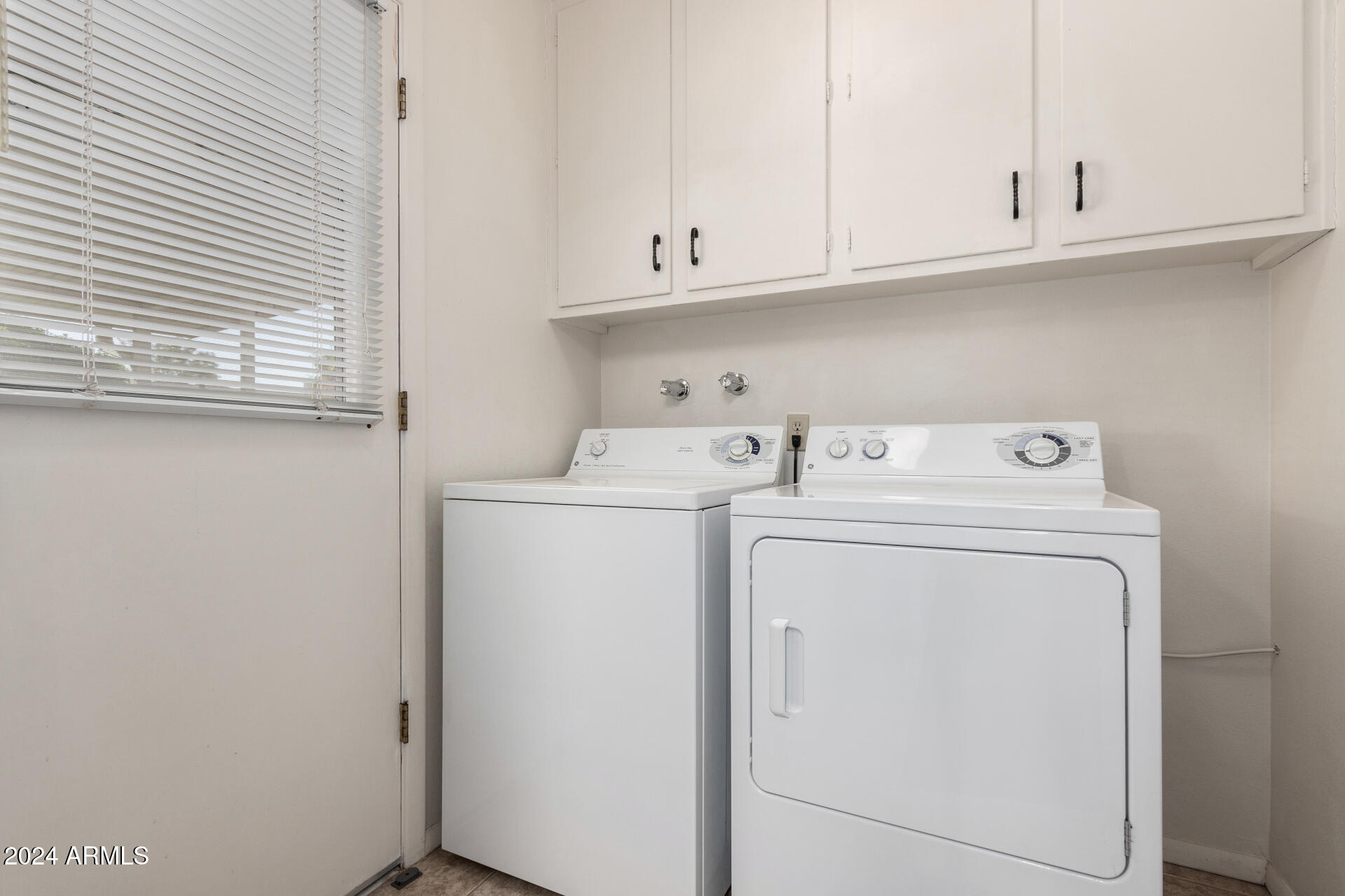 10819 West Hatcher Road Sun City, AZ 85351 - Photo 34 of 51 34 Laundry