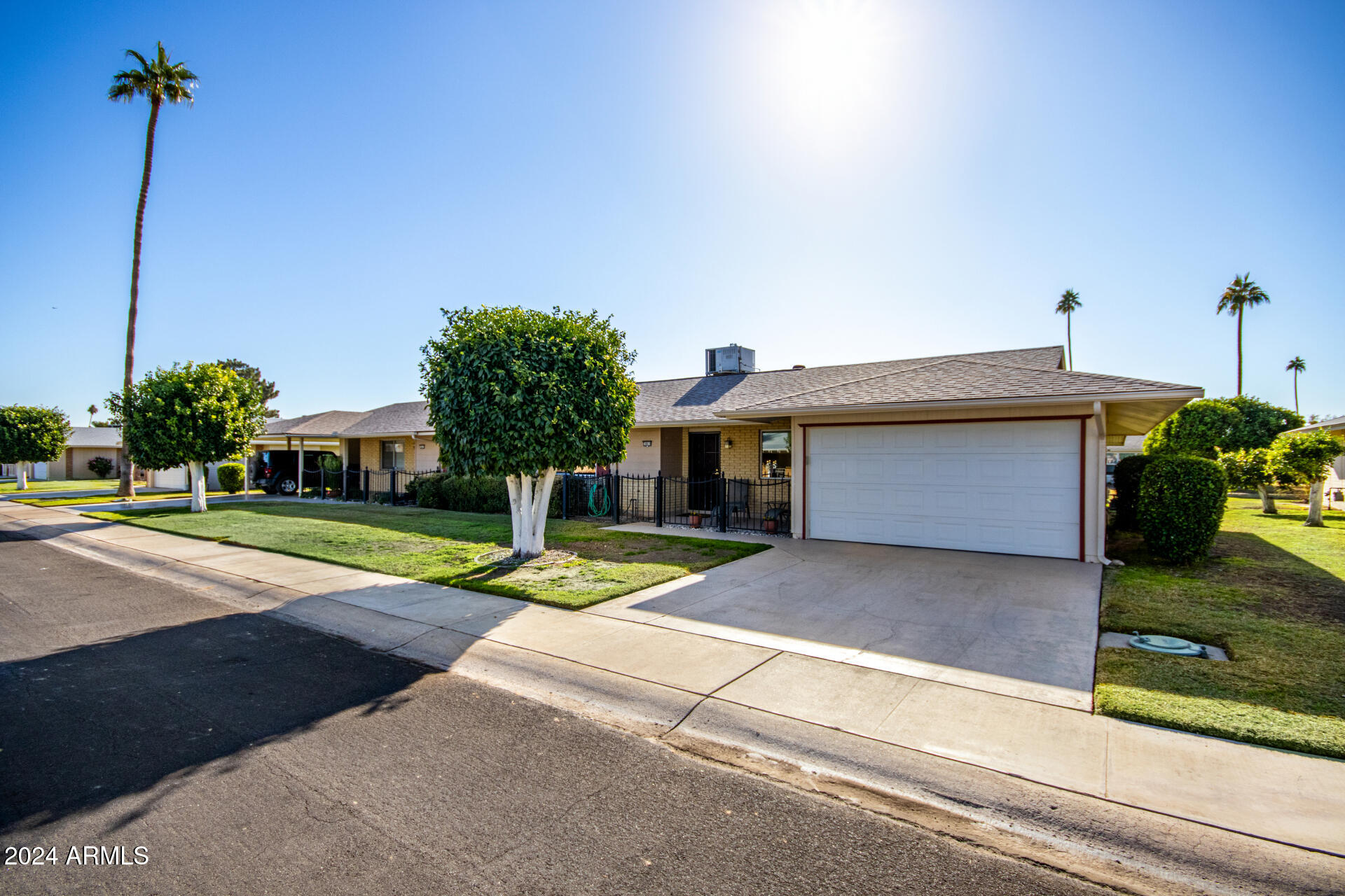 10819 West Hatcher Road Sun City, AZ 85351 - Photo 4 of 51 04 Front