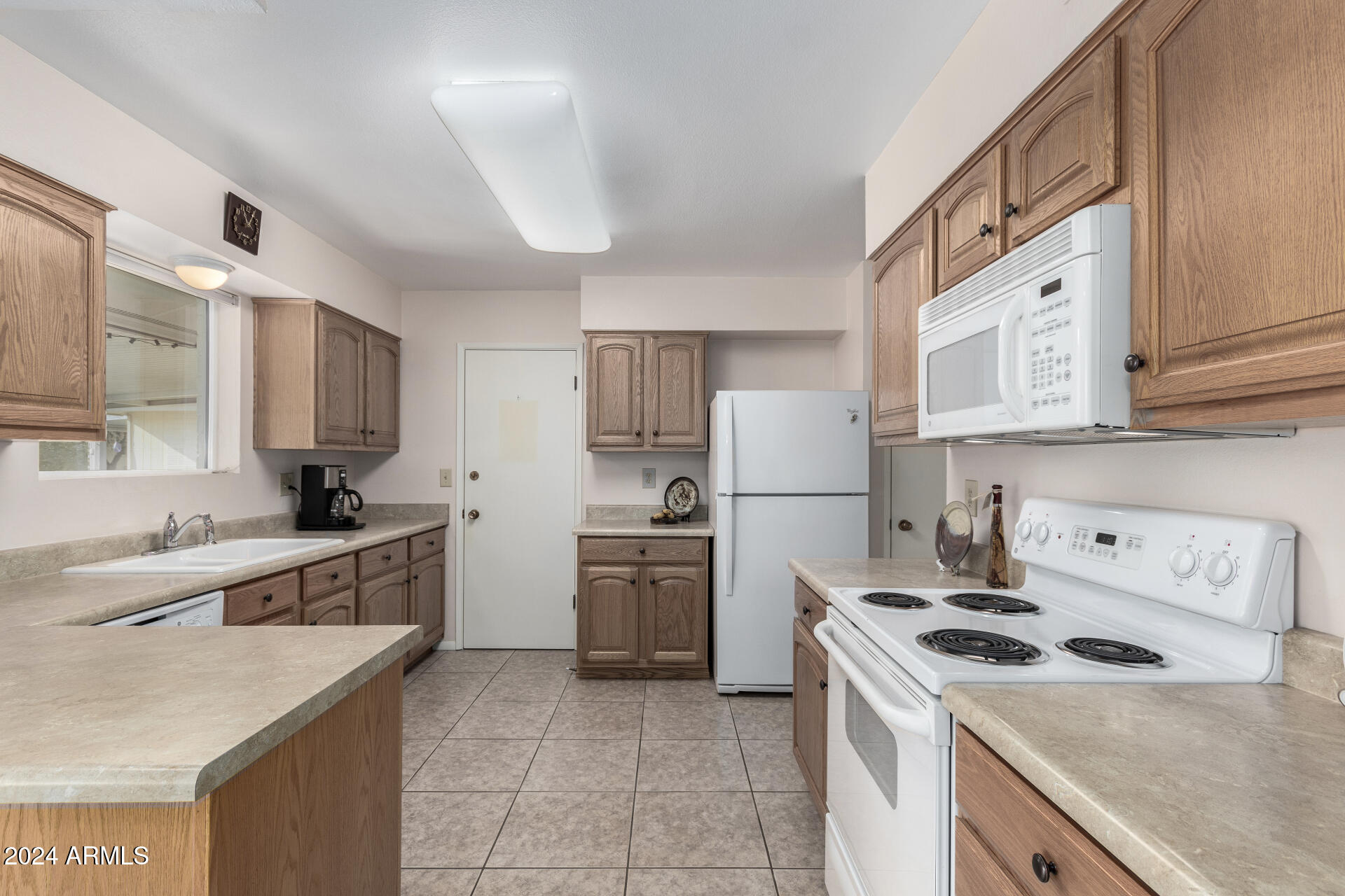 10819 West Hatcher Road Sun City, AZ 85351 - Photo 9 of 51 09 Kitchen