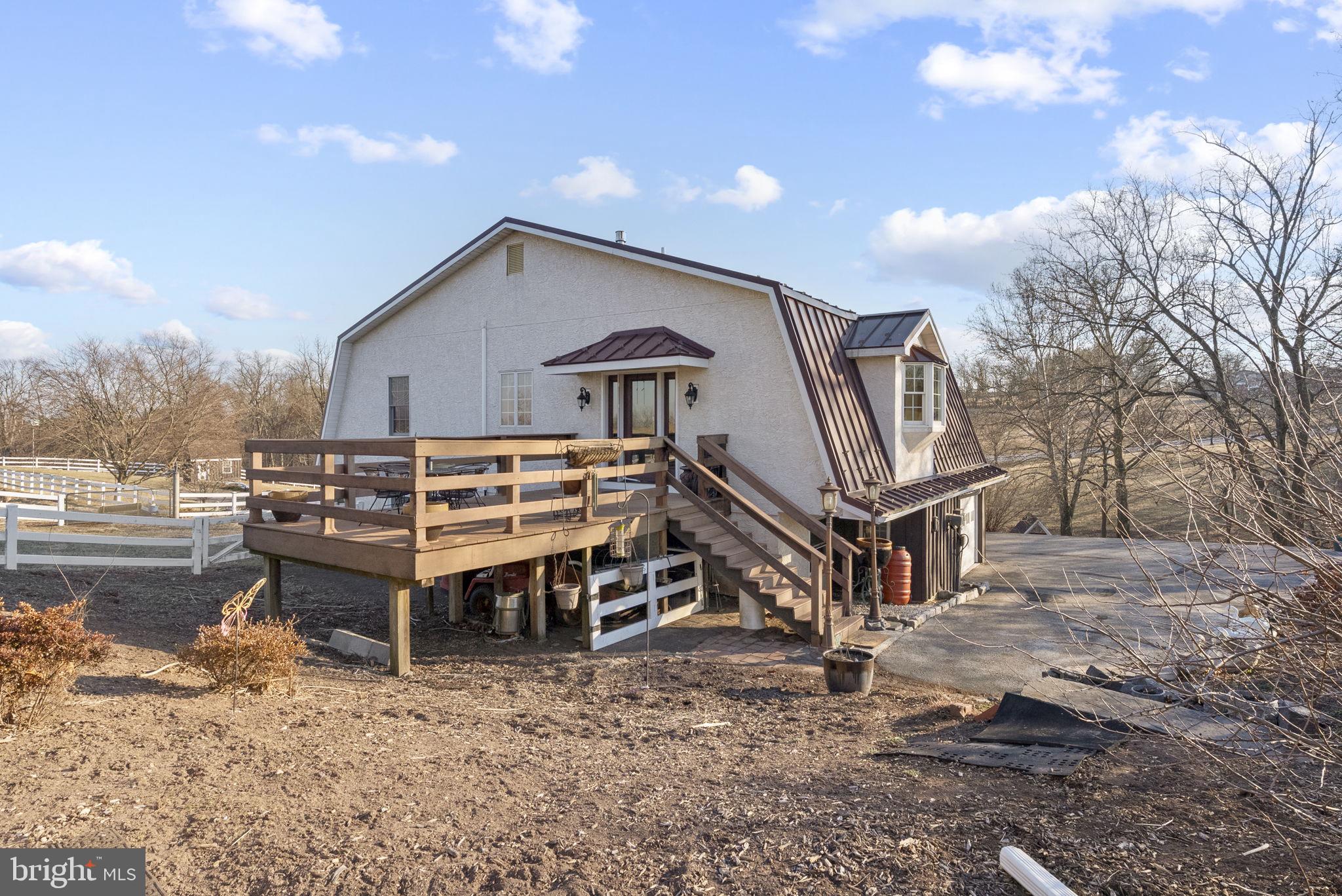 185 Spring Hollow Road Spring City, PA 19475 - Photo 2 of 33 a view of a house with a yard and wooden fence